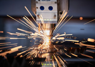 Metal processing on cnc laser machine with sparks